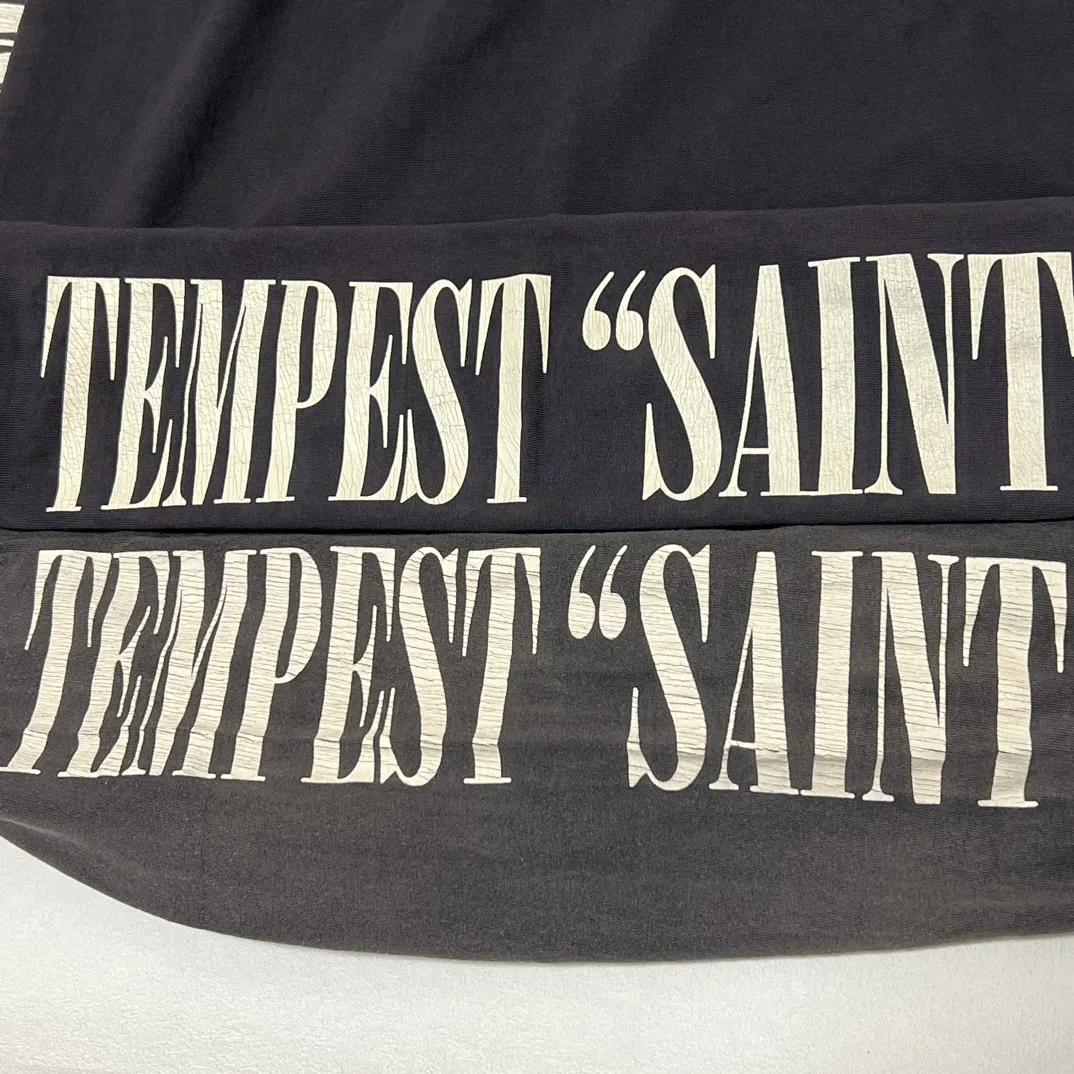 Top printing technology Purchasing agent level SAINT Mxxxxxx LS TEE/TEMPEST/BLK 'TEMPEST SAINT' Storm Religious Saint Crack Retro Vulcanization Rewashed Water Long Sleeves Washed Black S-XL Assute Dyeing Multi-digit horse fading process Hand polished hanging holes Full of old feel